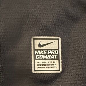 Nike Black Athletic Top with White Nike Pro Combat Patch